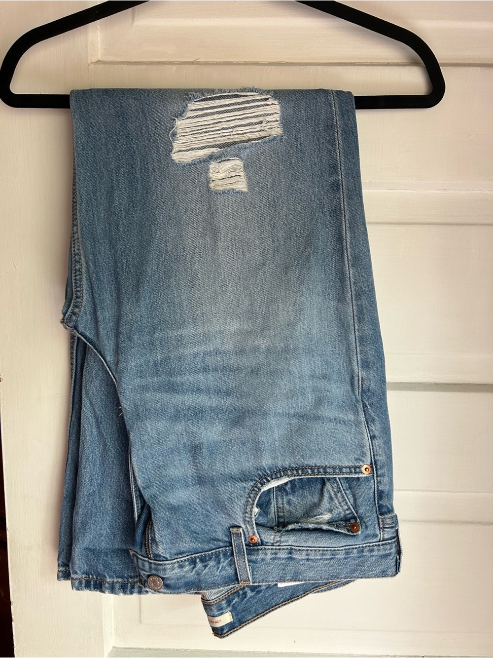 Levi's Light Blue Straight Leg Jeans with Distressed Detail